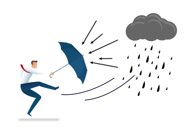 Ein Geschäftsmann mit Regenschirm trotzt einem heftigen Regensturm.